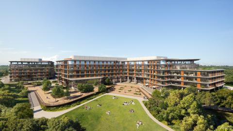 Rendering of a large office complex with cantilevered floors and window walls. A large lawn is in the front.