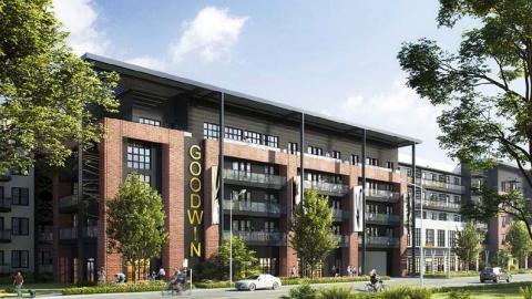 Rendering of a five-story brick apartment complex with a covered rooftop.