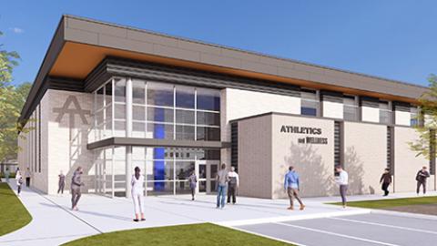 Rendering of a two-story white brick building with lettering that reads “Athletics and Wellness” on the front and a few people milling around on the sidewalk.